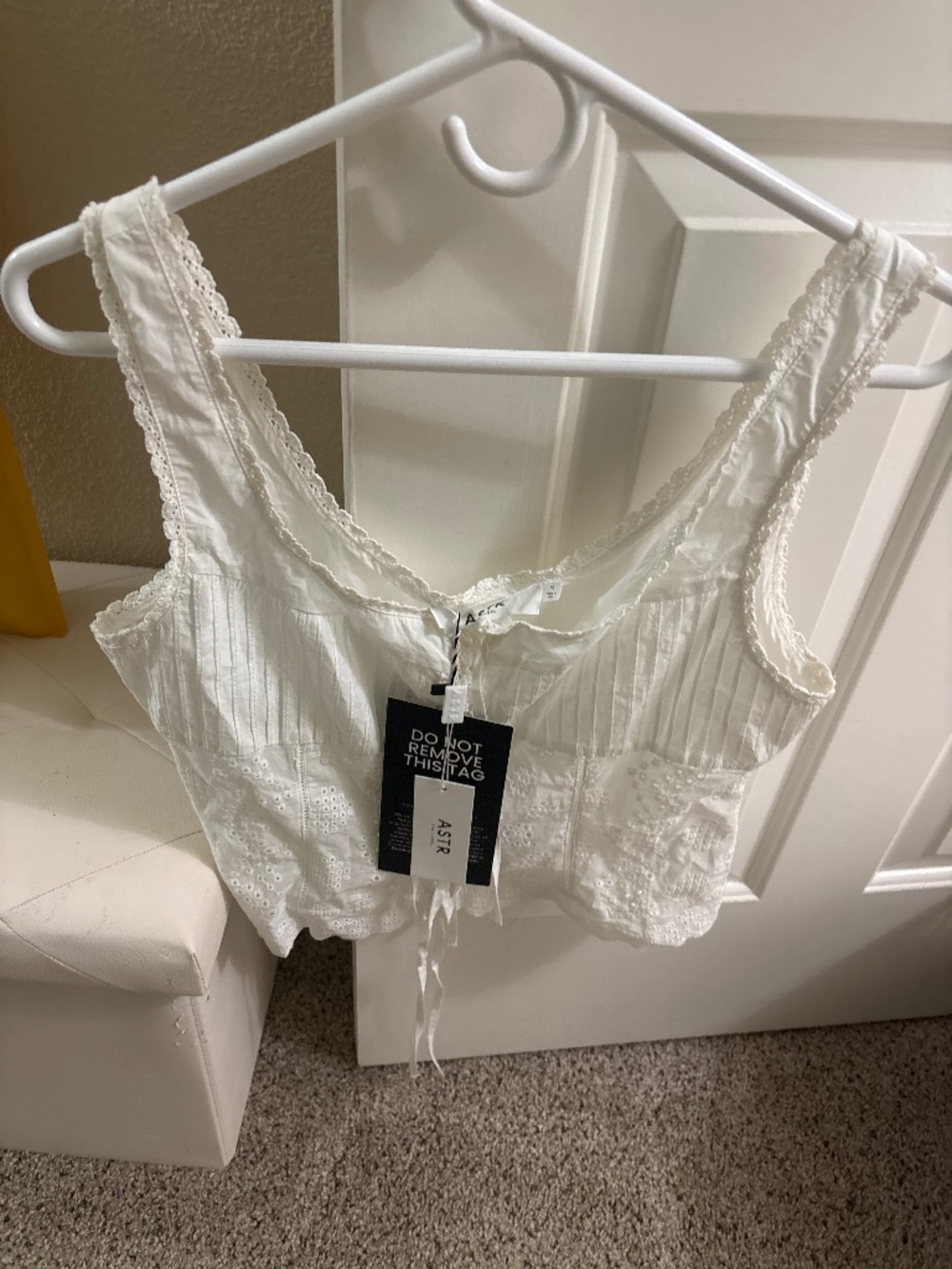 Astr the label, white eyelid, sleeveless blouse, new with tag size medium